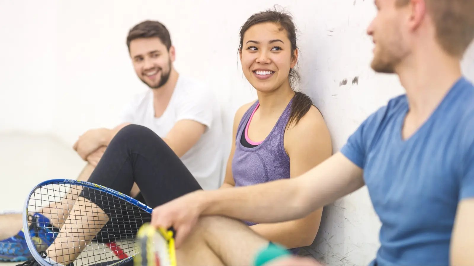 Promotes social interaction - Playing Racquetball