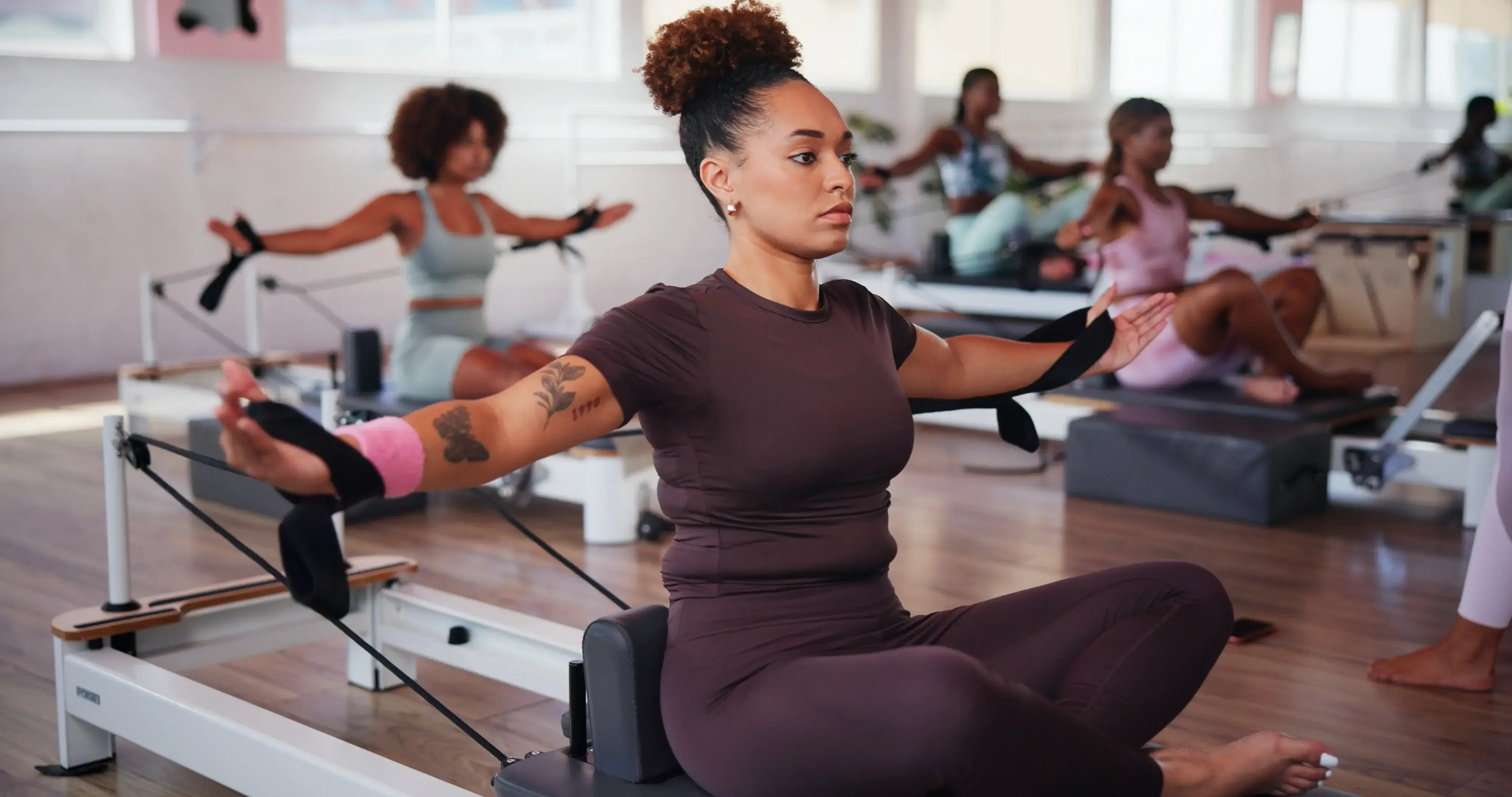 reformer-pilates-group-class-strap-workout